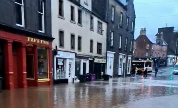 Forfar's flooded West High Street near The Cross.