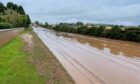 The A932 in Forfar flooded.