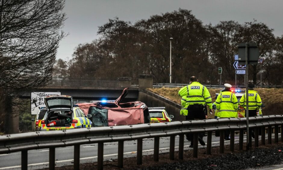 Police at the scene of the crash on the A90, near St Madoes, on February 20, 2021.