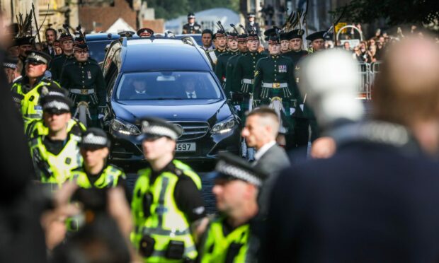 The procession of Queen Elizabeth's coffin from the Palace of Holyroodhouse to St Giles' Cathedral. Mhairi Edwards / DC Thomson