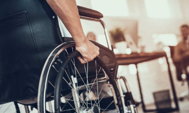 The Glenrothes carer mocked a wheelchair user.