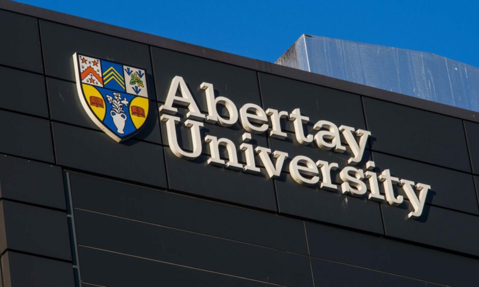 Sign on the outside of an Abertay University building