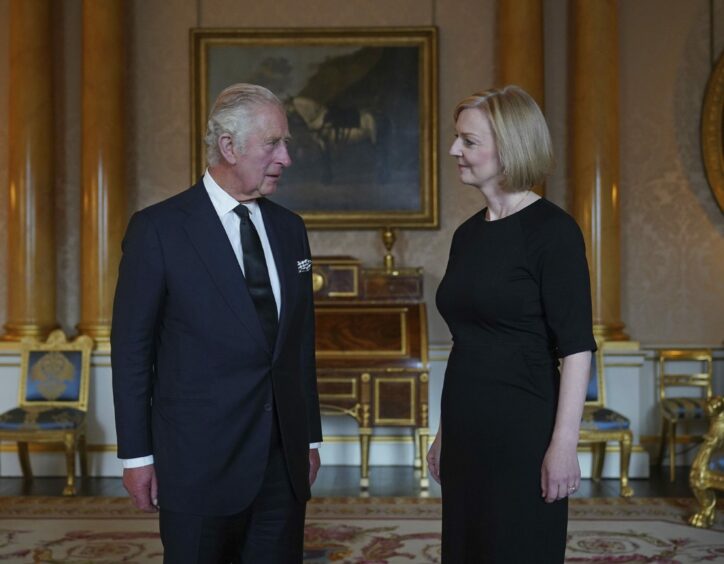 Photo shows King Charles and Liz Truss meeting for their first audience at Buckingham Palace.