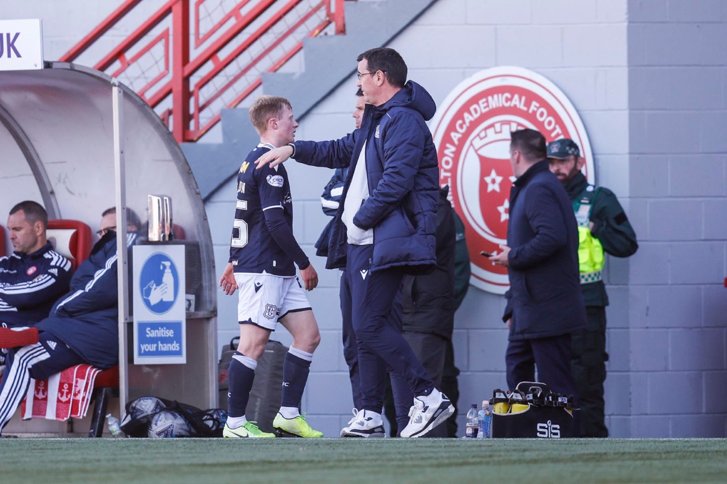 Lyall Cameron gets a pat on the back from boss Gary Bowyer.