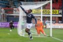 Zach Robinson celebrates making it 2-1 (Image: David Young/Shutterstock).