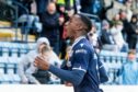 Dundee striker Zach Robinson celebrates his winner against Ayr (Image: David Young/Shutterstock)