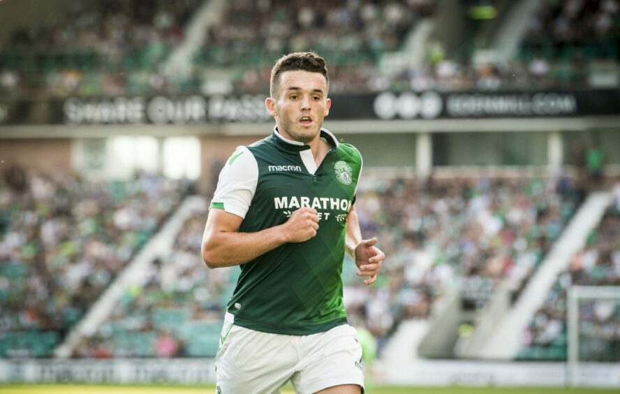 John McGinn in action for Hibs.