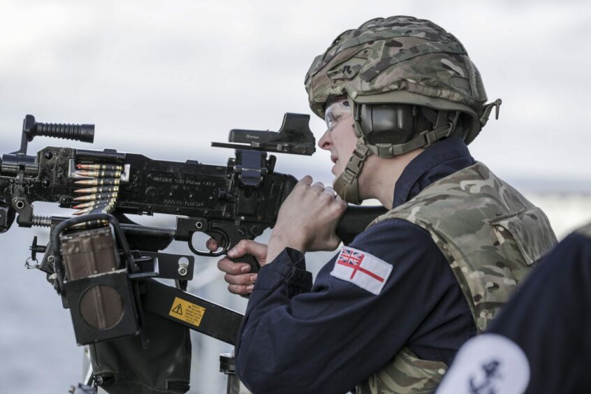 Training with a mini-gun at sea during a previous Exercise Joint Warrior