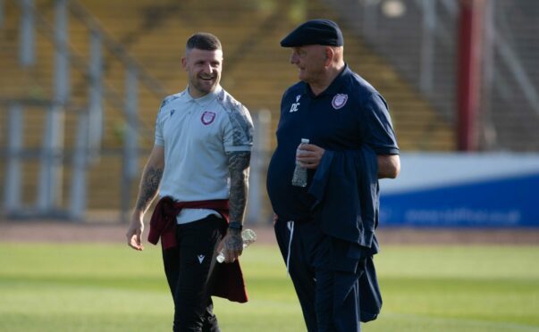 All smiles between Bobby Linn and gaffer Dick Campbell previously - but that wasn't the case on Saturday afternoon. Image: SNS