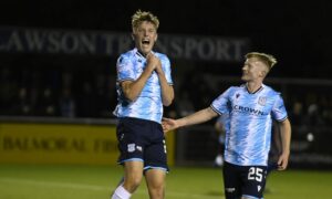 Max Anderson celebrates a Dundee goal at Cove Rangers alongside fellow academy graduate Lyall Cameron. Image: SNS.