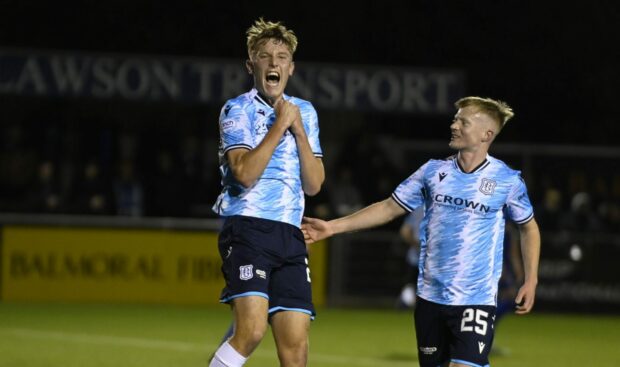 Max Anderson celebrates a Dundee goal at Cove Rangers alongside fellow academy graduate Lyall Cameron. Image: SNS.