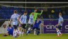 Connor Scully (No 4) scores a superb overhead kick to put Cove Rangers 3-1 up against Dundee. (Image: SNS)