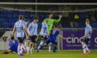 Connor Scully (No 4) scores a superb overhead kick to put Cove Rangers 3-1 up against Dundee. (Image: SNS)