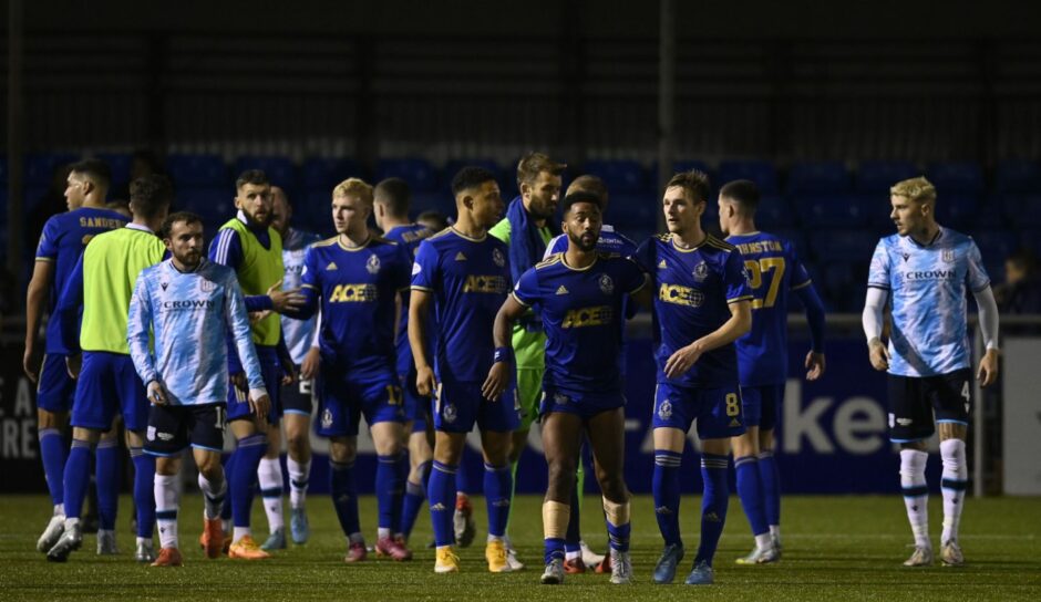 Cove Rangers celebrate at full-time after seeing off Dundee.