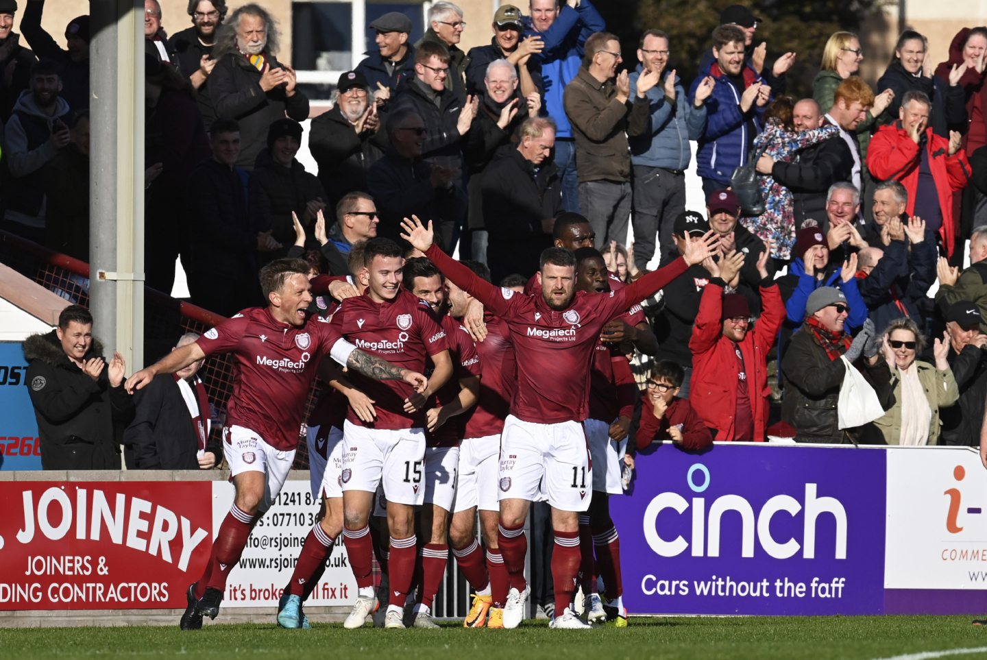 Bobby Linn celebrates his screamer against Dundee.