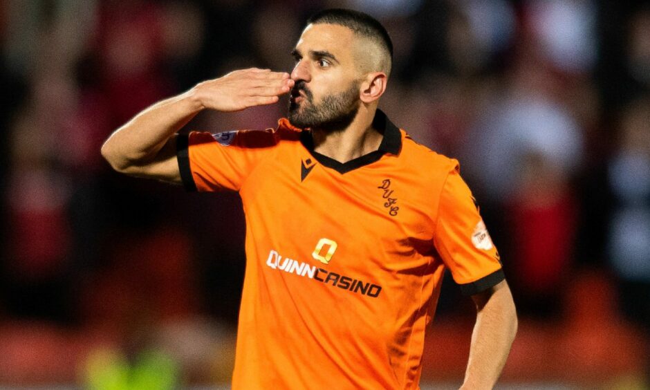 Aziz Behich celebrates a Dundee United goal. Image: SNS