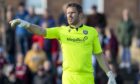 Arbroath keeper Derek Gaston remains optimistic that his side will be able to get off the bottom of the Championship. Image: SNS