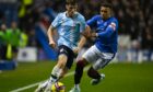 Dundee kid Josh Mulligan takes on Rangers skipper James Tavernier (Image: SNS).