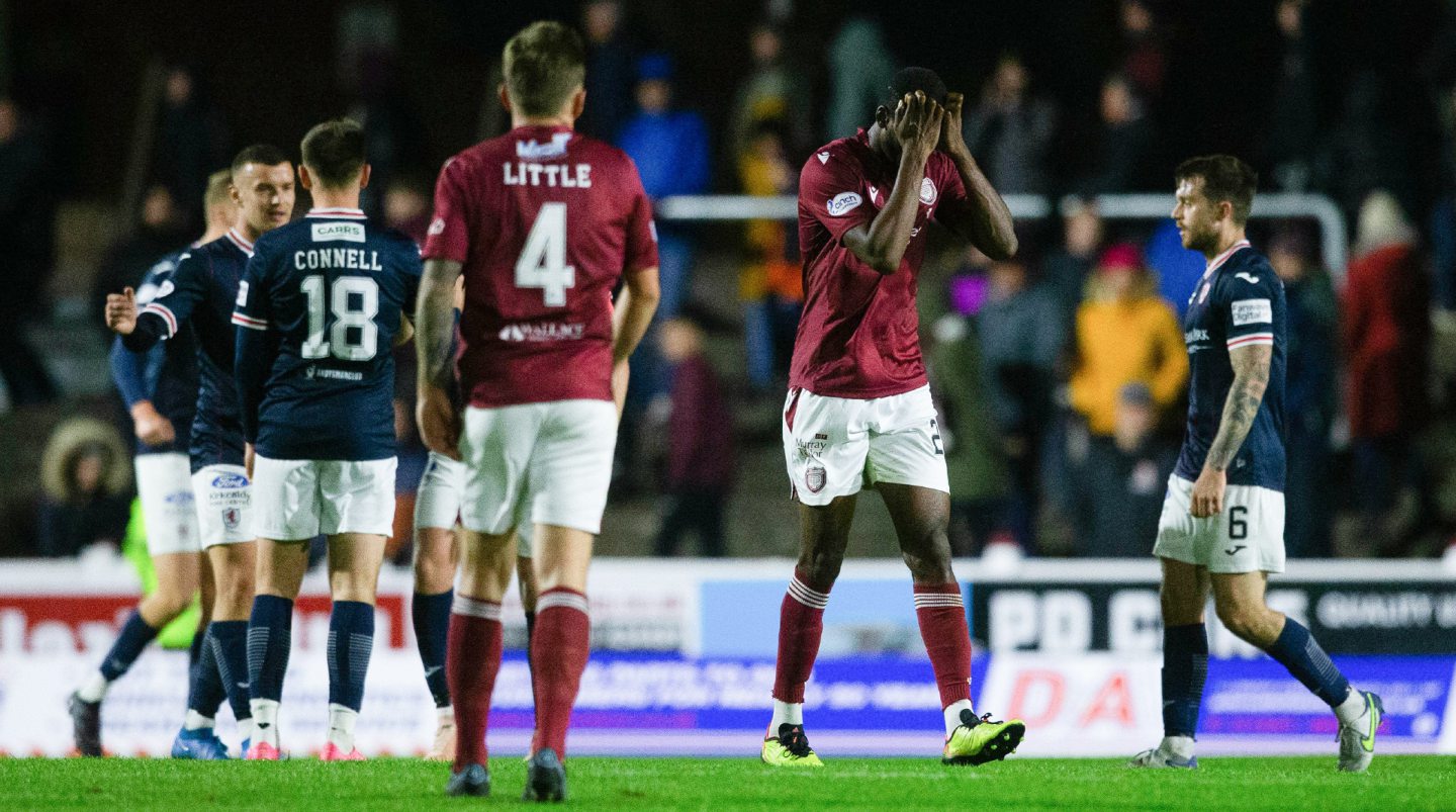 Arbroath's Scott Bitsindou with his head in his hands after the defeat to Raith Rovers in midweek. Image: SNS