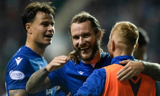 Stevie May celebrates making it 2-1 against Hibs. Image: SNS.