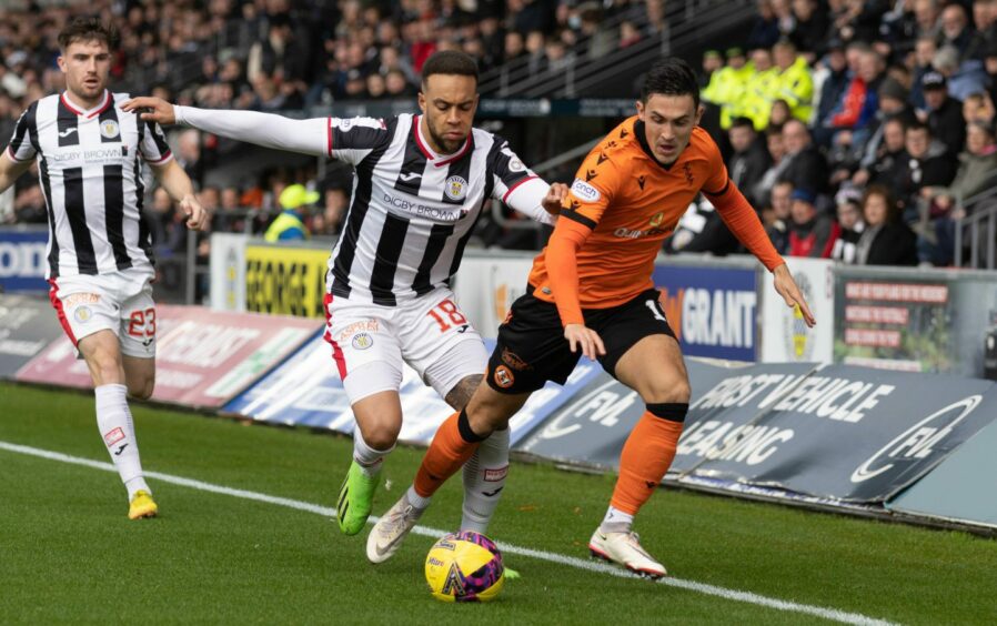 Charles Dunne in action against Dundee United.