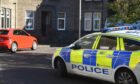 Police are carrying out enquiries on Morgan Place in Dundee following the unexplained death of a teenage girl. Image: Amie Flett/DCT Media.
