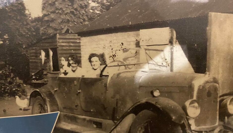 Phil's granny Connie Burnett driving in the Lagonda in the early 1950s with Phil's grandad Walter Burnett in the passenger seat and his Auntie Jean in the back.