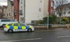 Police at Brook Street in Dundee. Image: Matteo Bell/DC Thomson.