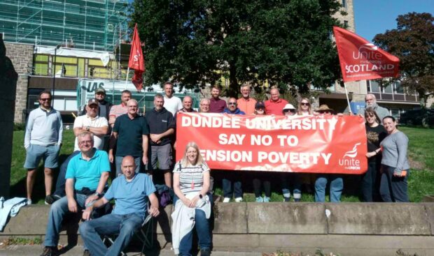 Staff members striking over pension changes outside Dundee University.