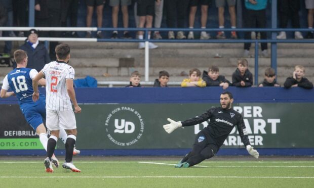 Matthew Wright gets his and Montrose's second. Photograph: Craig Brown.