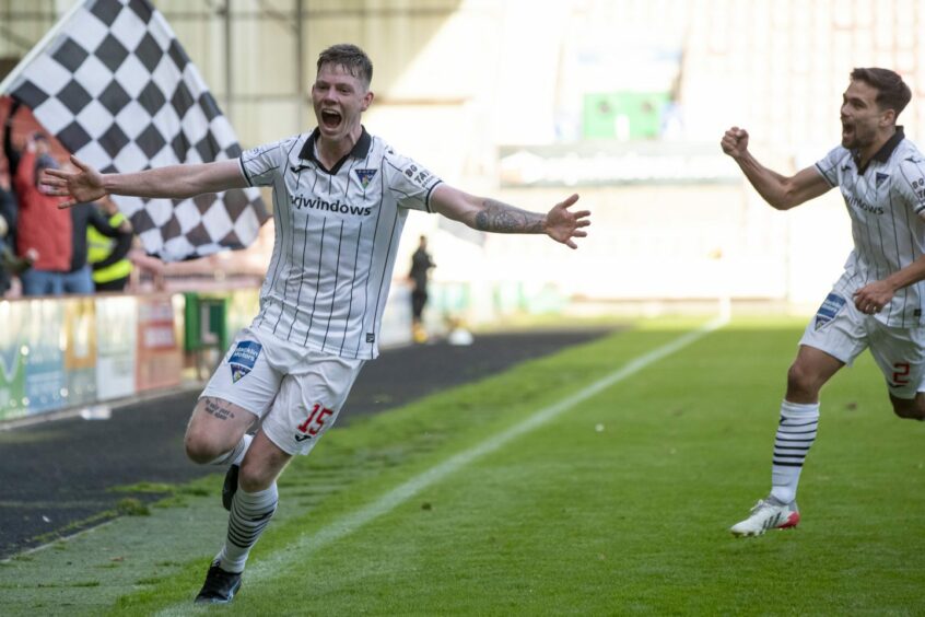 Sam Fisher celebrates during his time at Dunfermline