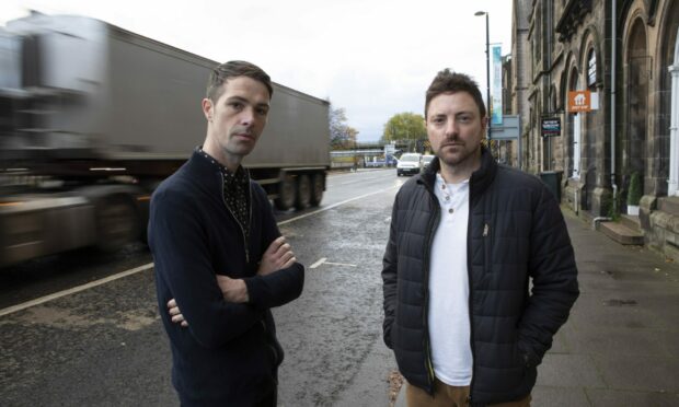 Cameron Grassick, left, and Graeme Pallister own businesses on the affected section of Tay Street Perth. Image: Phil Hannah.