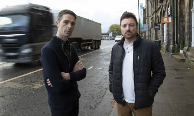 Cameron Grassick, left, and Graeme Pallister worry that upcoming Scottish Water works on Tay Street will destroy their businesses. Image: Phil Hannah.