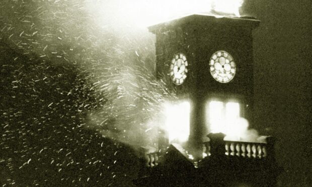 The clock tower was set alight in the 1980s.