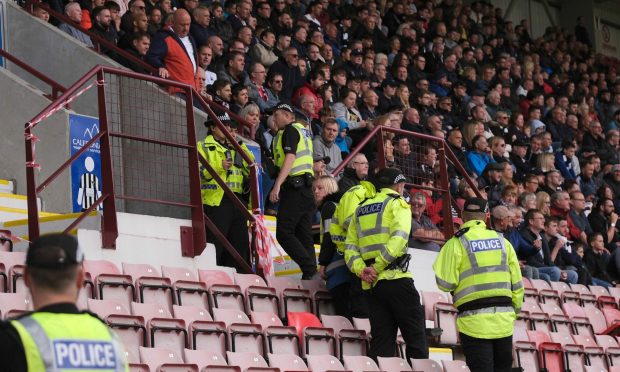Police move into the stand after the incident. Image: Alex Todd | Sportpix.org.uk.