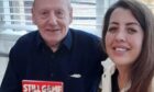 Dundee pensioner Ernie McKay and Leann Sutherland with Still Game DVD