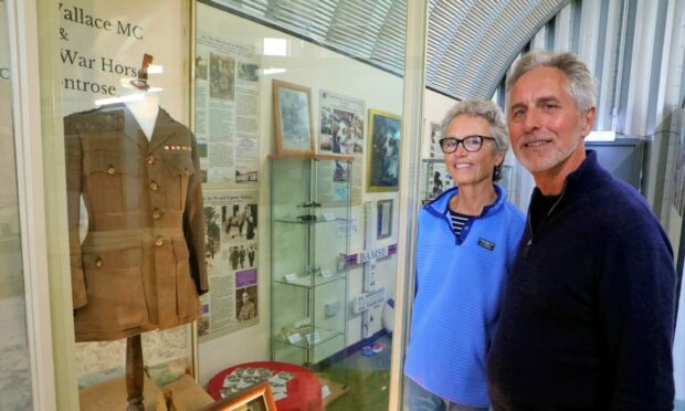 John Wallace and wife Meg from Massachusetts at the war horse display of Capt. Alexander Wallace in Montrose. Image: Gareth Jennings/DC Thomson.