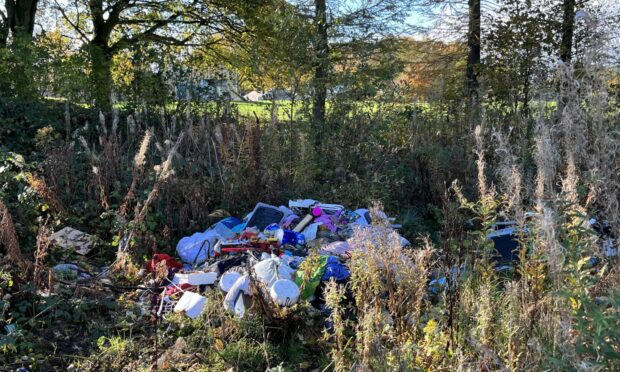 The rubbish was dumped just hundreds of yards from Forfar recycling centre. Image: Graham Brown/DCThomson
