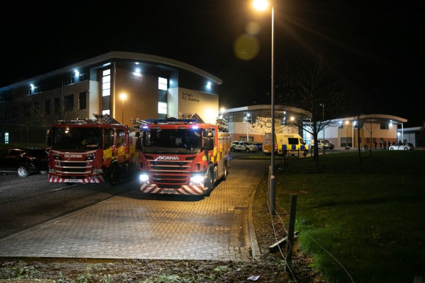 Emergency services in the car park at St Paul's RC Academy on Gillburn Road. 