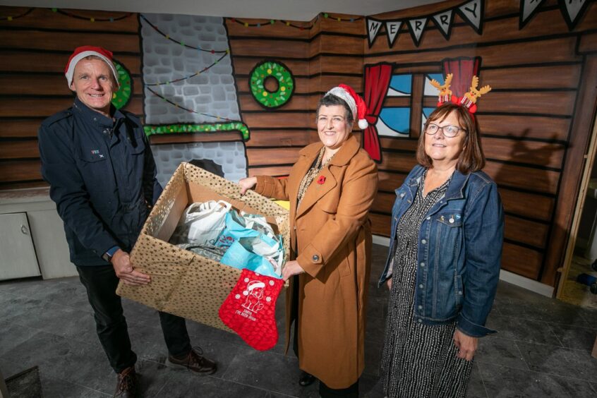 Colin and Lorraine Clement and councillor Lynne Short (centre) with early donations