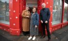 Councillor Lynne Short with Lorraine Clement and Colin Clement at the Stobswell grotto. Image: Kim Cessford / DC Thomson.