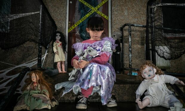 Kenzie Phillips, 6, provides a haunting welcome to her family's home in Kirkton. Image: Kim Cessford / DC Thomson.