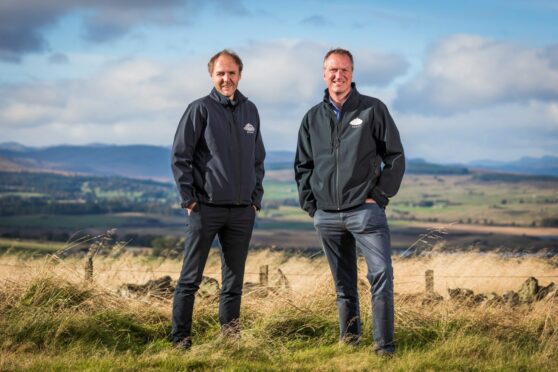 Mark Steven and Simon Oldham, joint managing directors at Highland Spring, on the Ochill Hills.. Ochill Hills. Image: Highland Spring.