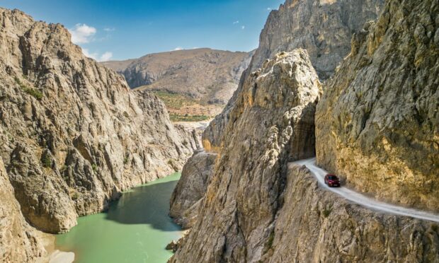 The infamous Stone Road in Turkey takes you through tunnels and along cliffs above the Euphrates. Image: Mazda.