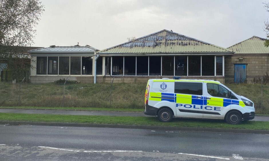 Police outside the old Dobbies building at Hillend Industrial Estate. Image: Neil Henderson.