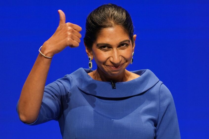 Photo shows Suella Braverman giving a thumbs-up gesture.
