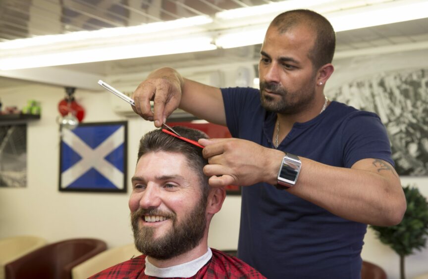Ferdi Gul pictured during a charity haircutting event in 2014.
