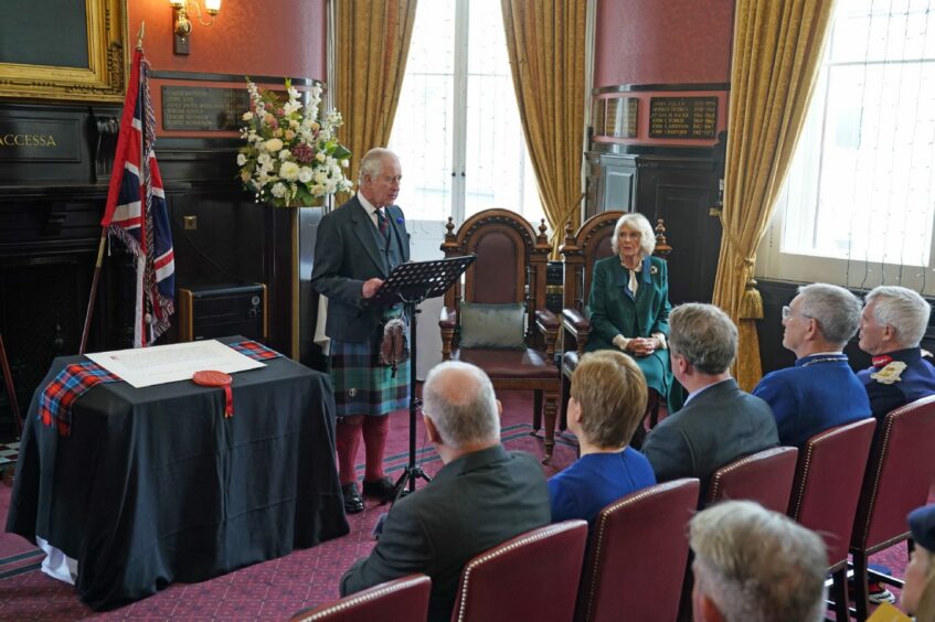 King Charles III and the Queen Consort attend an official council meeting at the City Chambers in Dunfermline.