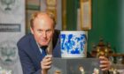 Nick Burns with the Chinese brush pot he auctioned for £51,000. Image: Steve MacDougall/ DC Thomson