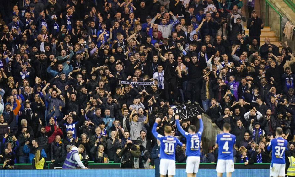 St Johnstone fans celebrate at the end of Friday night's 2-1 victory against Hibs. Image: PA.